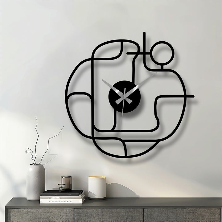 Highlighting the darkest area, this image showcases a modern abstract line metal wall clock, presenting unique metal art for wall in a minimalist, contemporary style.
