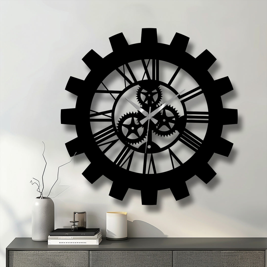 Black defines this industrial gear Roman numeral metal wall clock, making it a stunning piece of decorative metal art for a loft or modern space.