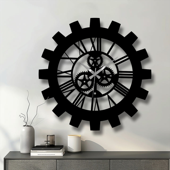 Black defines this industrial gear Roman numeral metal wall clock, making it a stunning piece of decorative metal art for a loft or modern space.