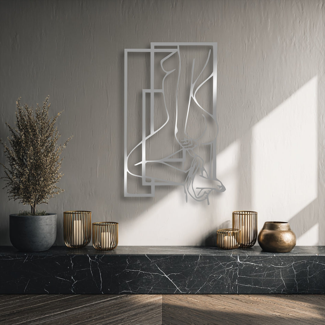 The realistic detail of the metallic sheen on the abstract feminine silhouette metal art for wall, highlighting its intricate geometric frames.