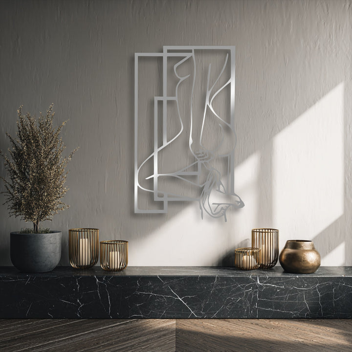The realistic detail of the metallic sheen on the abstract feminine silhouette metal art for wall, highlighting its intricate geometric frames.