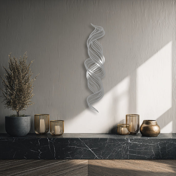 The layering effect of the flowing abstract lines in this twisted metal wall decor creates a dynamic, multi-dimensional display.
