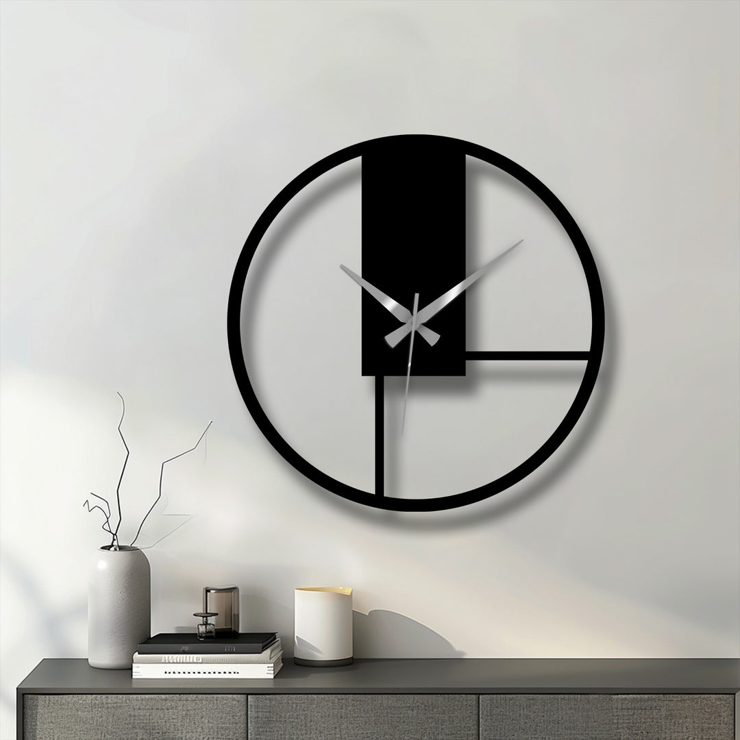 Elegant curves of the minimalist geometric panel metal artwork form a visually striking contrast against the stark lines in this modern wall clock.