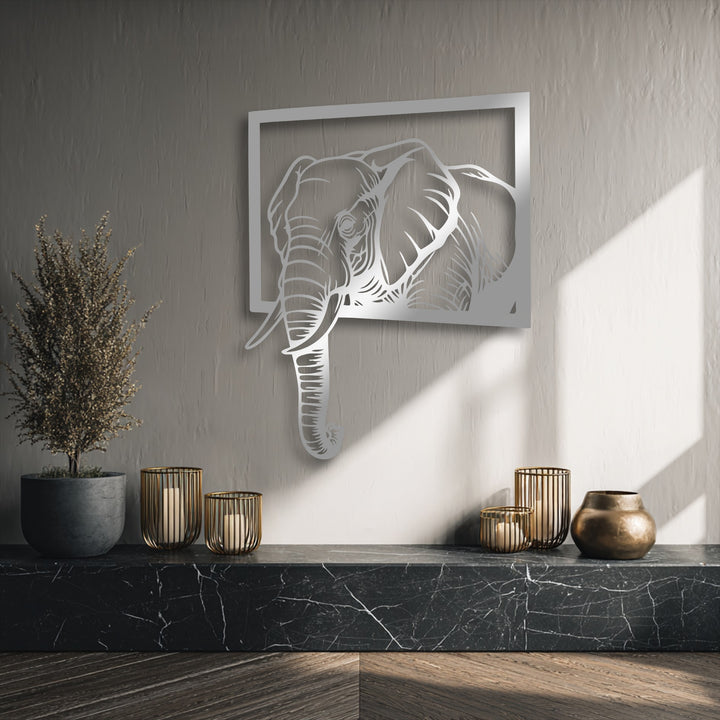 The captivating focal point is a silver-toned elephant emerging from its frame, a stunning metal art for wall with a dynamic 3D effect.