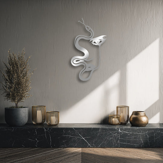 The textured light gray background wall, showcasing sunlight and shadows, provides an ideal setting for the metal decoration wall art.