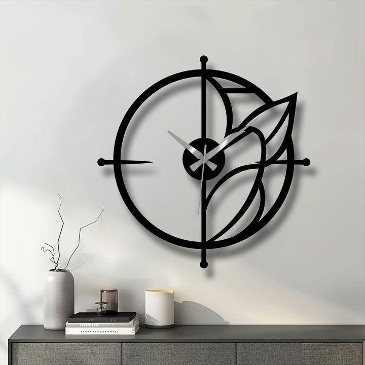 Illuminated by the brightest area, this modern leaf accent circular metal decoration wall art clock casts an inviting glow on the wall.