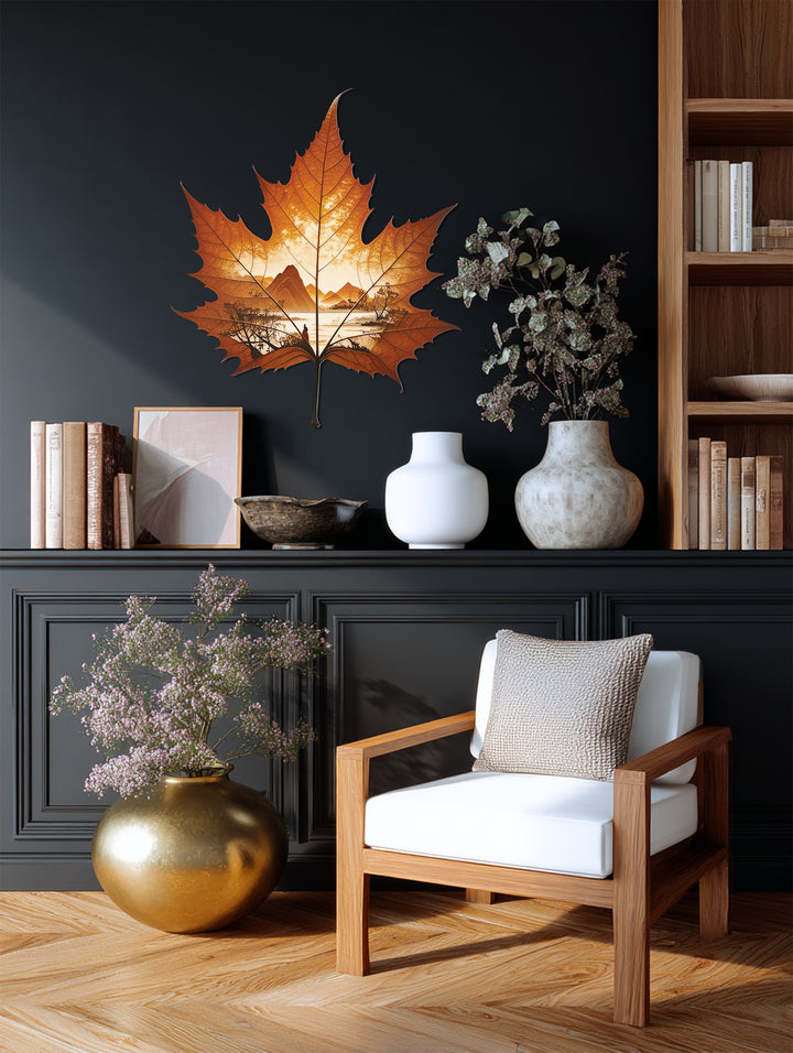 Appealing autumn horizon maple leaf metal wall art showcases a captivating mountain landscape, offering a unique metal wall art piece for nature-inspired decorating.
