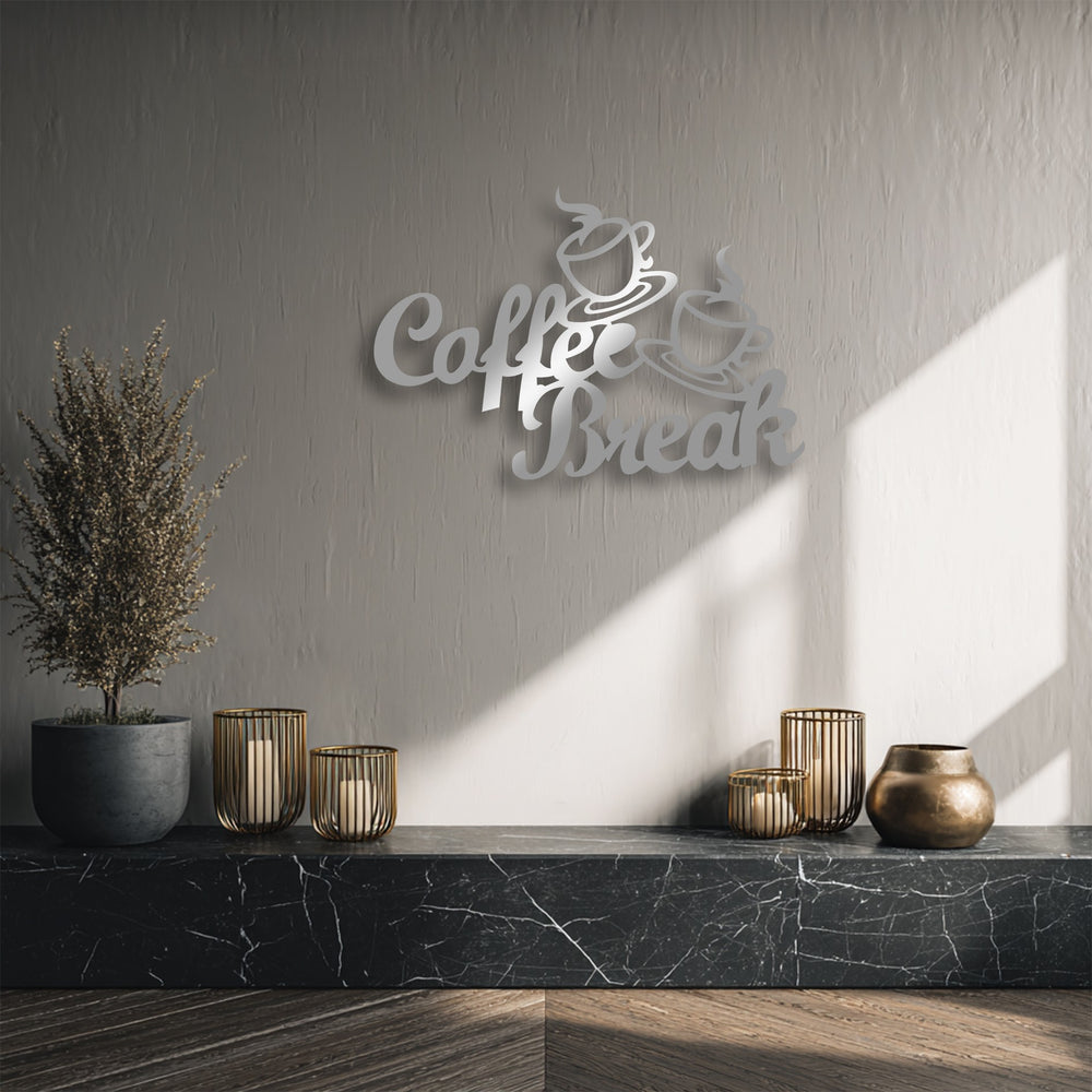 Color contrast: The reflective silver Coffee Break script metal artwork strikingly stands out against the muted wall.