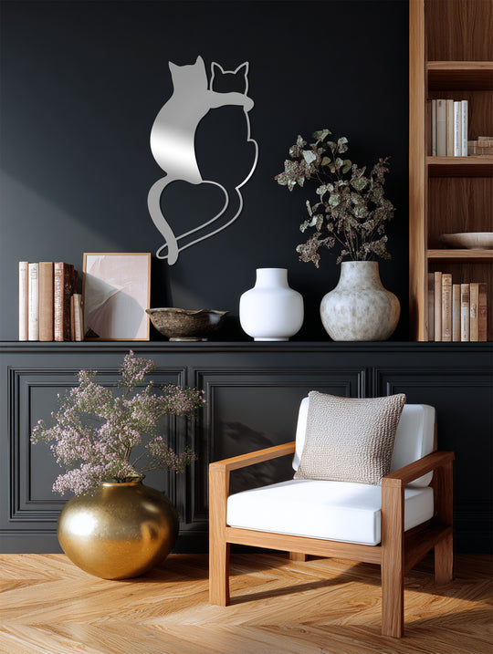 Subtle shifts in tone highlight the reflective surface of this loving cats silhouette, demonstrating the beauty of minimalist metal artwork in its design.