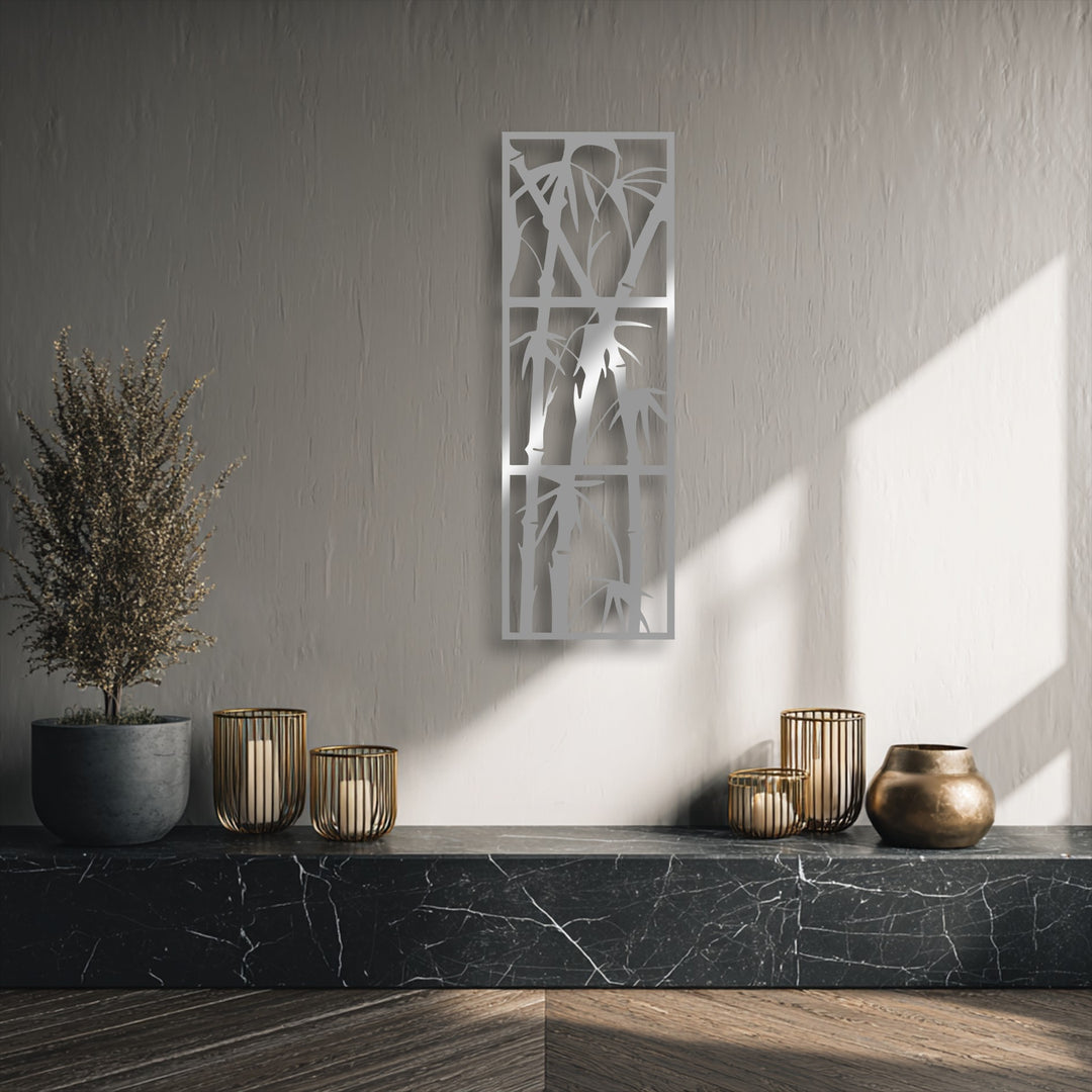 The elegant brushed silver finish of the minimalist bamboo metal wall decor adds a serene touch to the room.