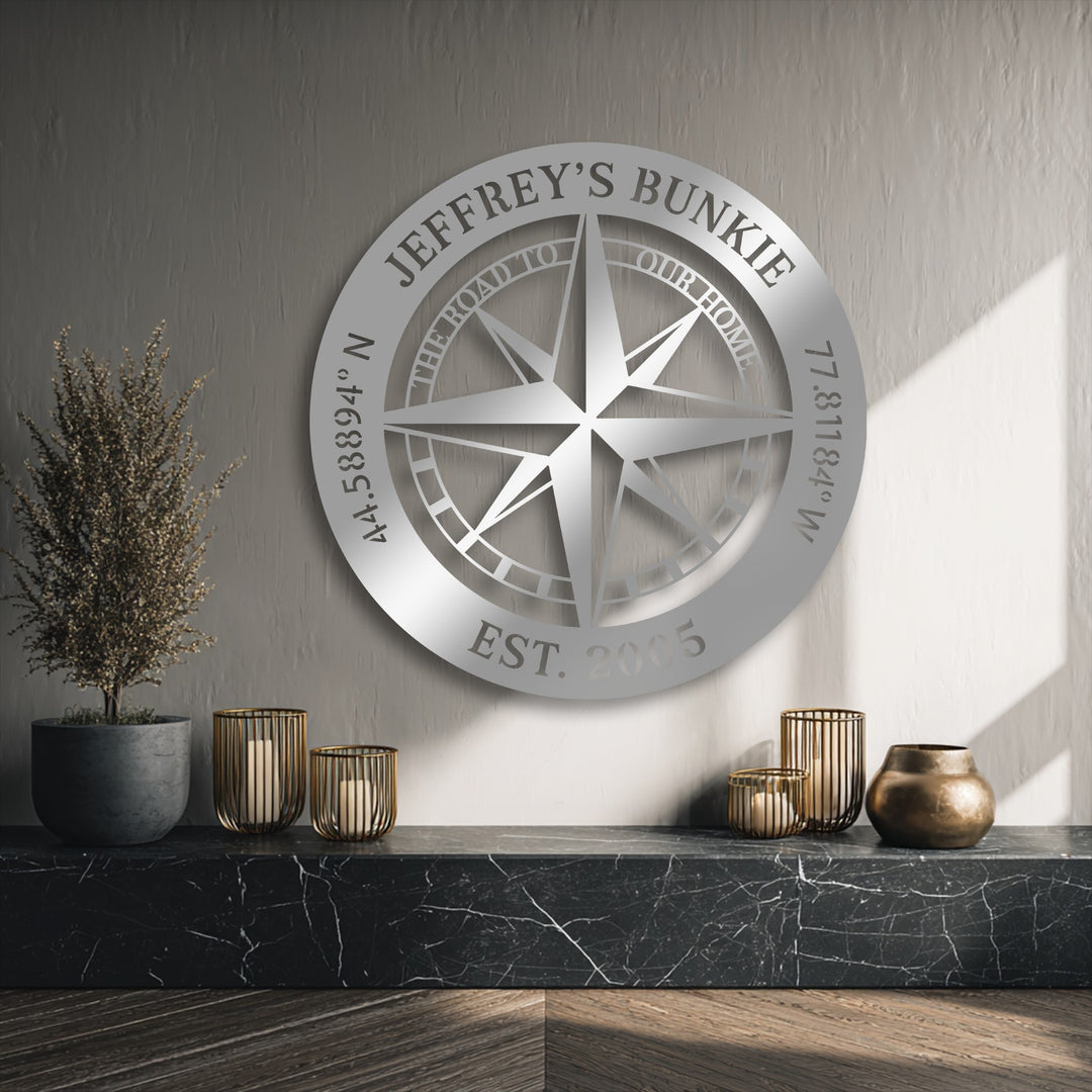 A sleek brushed silver finish adorns the personalized compass metal decoration wall art, offering a modern aesthetic.