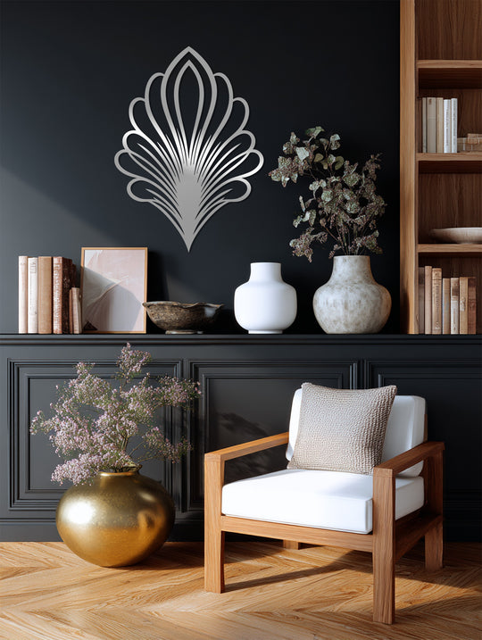 The somber mood is captured with sophisticated metal art for wall, showcased in an abstract botanical leaf sculpture, bringing a touch of modern elegance to the space.