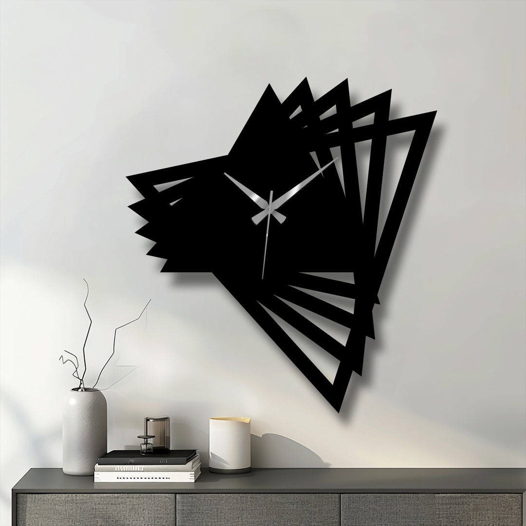 Monochromatic color saturation emphasizes the bold geometric design of the abstract origami metal artwork clock, a modern and decorative wall art accent.