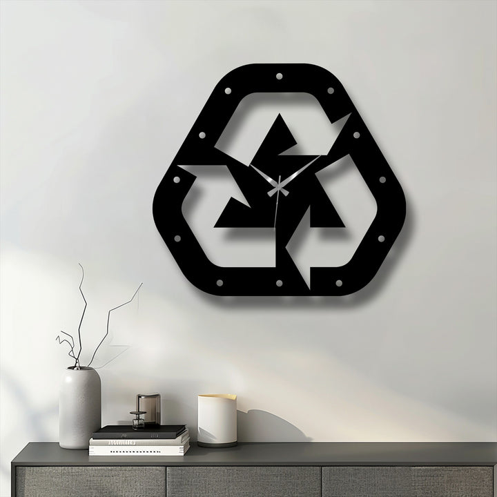 Highlighting the layering effect, the recycle symbol metal wall clock shows layers constructing a compelling piece of unique metal wall art.