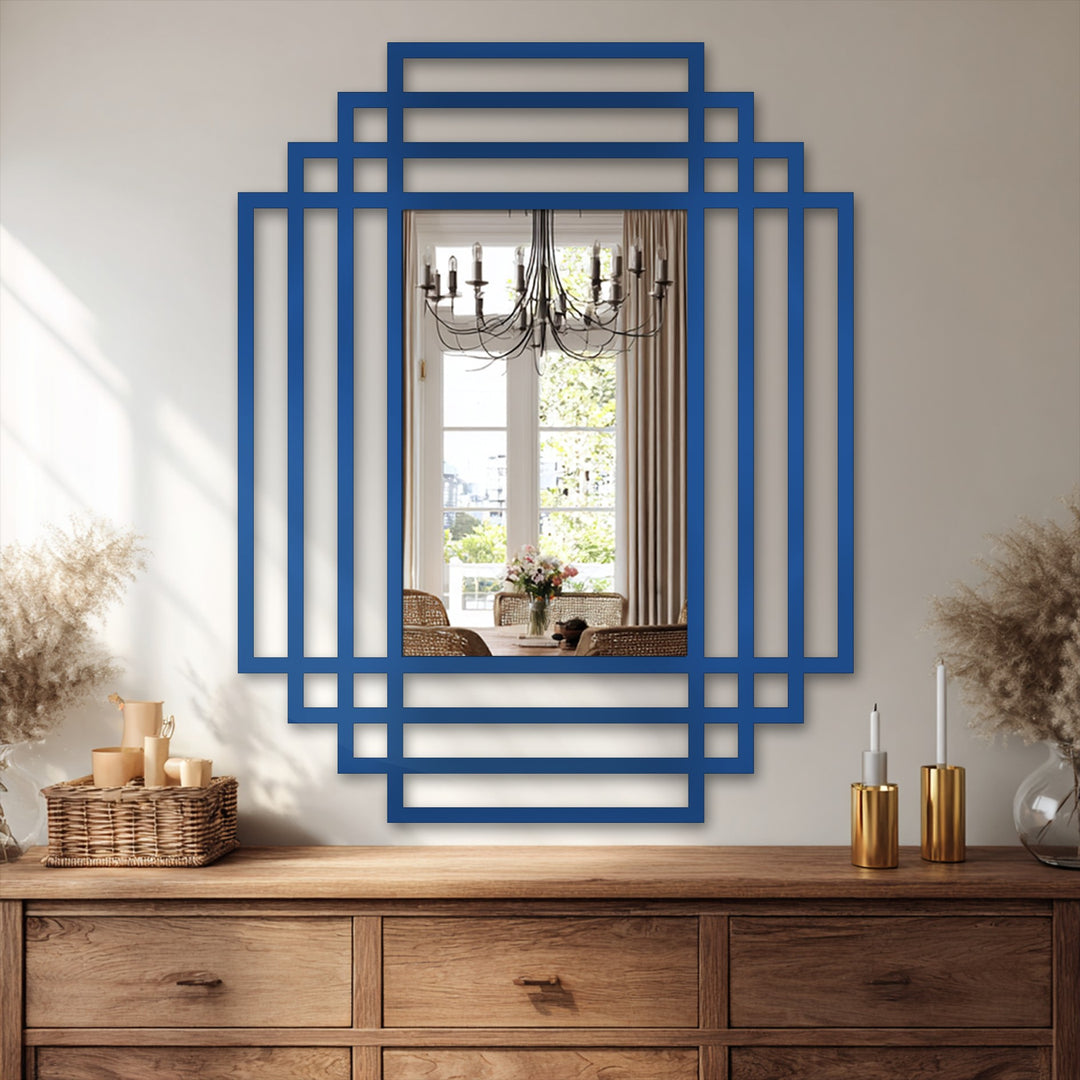 Brightest within the mirrored reflection reveals a dining room setting, framed by a striking symmetry grid decorative mirror featuring a modern, layered design in a bold, blue hue.