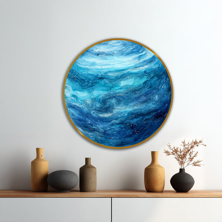 Circular oil painting art prints feature an abstract blue celestial ocean drift, showcasing dynamic geometric patterns within a gold frame for a modern aesthetic.