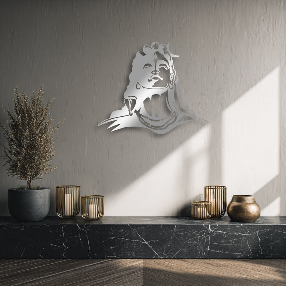 Highlighting a beautiful layering effect, this decorative metal art of Lord Shiva casts a deep shadow, adding dimension to the wall-mounted silhouette.