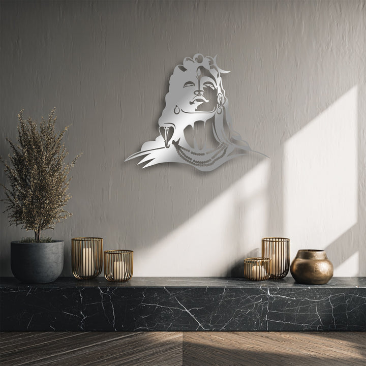 Highlighting a beautiful layering effect, this decorative metal art of Lord Shiva casts a deep shadow, adding dimension to the wall-mounted silhouette.