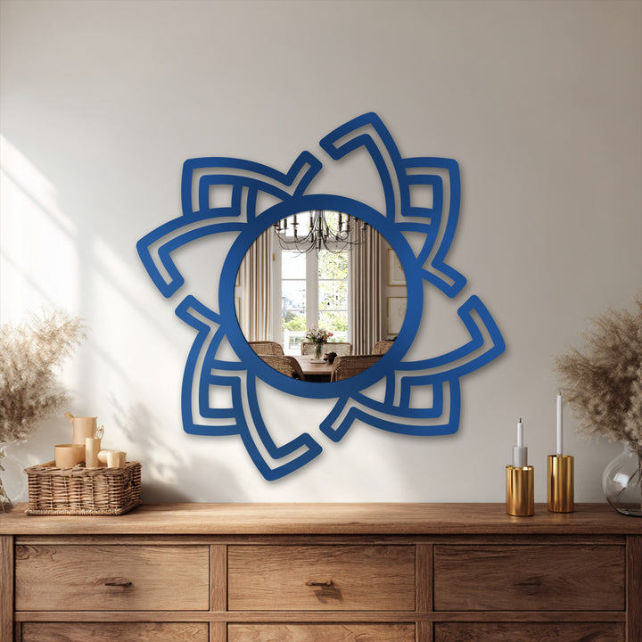 Exhibiting superior material quality, this abstract rotating frame shows a decorative metal art construction and is a striking modern mirror for wall decor.