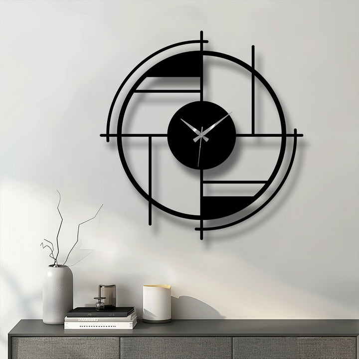Subtle shadows accentuate the best metal artwork in this geometric circle metal wall clock with a modern, abstract line design.
