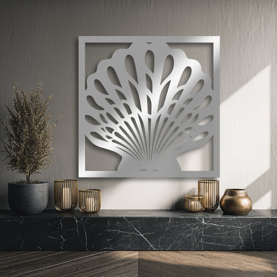 The high-quality silver metal artwork featuring an elegant seashell design within a sleek frame showcases superior craftsmanship and durability.