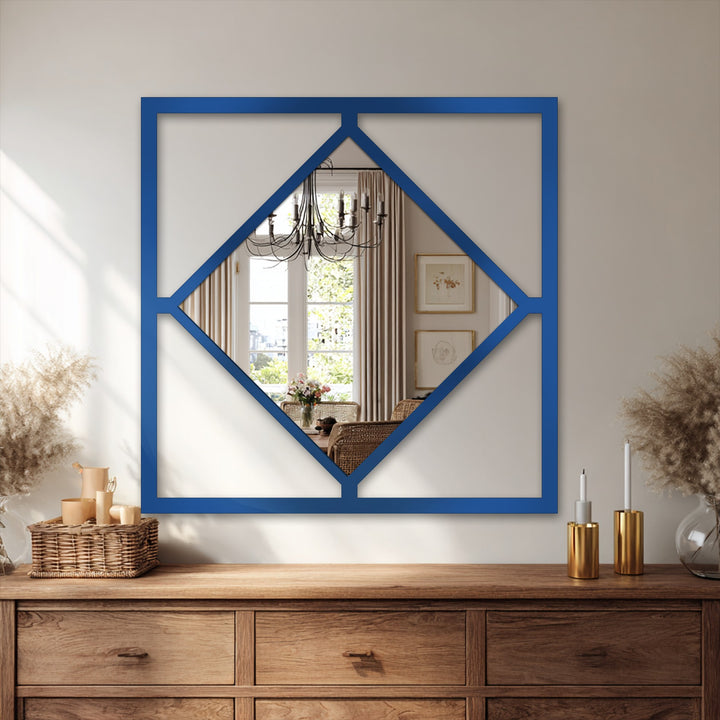 Bold, cobalt-blue finish highlights the diamond frame and square silhouette of this modern geometric metal artwork mirror.