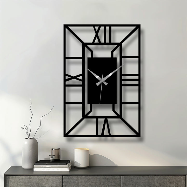 Negative space creates bold shapes within this architectural metal wall clock, a unique metal wall art piece featuring a geometric frame.
