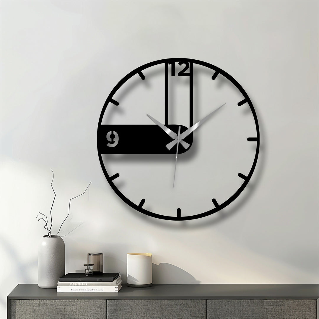 Warm, ambient lighting accentuates the asymmetrical design of the black metal art for wall clock, creating a minimalist focal point.