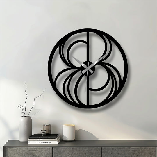 Negative space defines the swirl motif of this metal wall clock, a modern decoration wall art piece with a geometric design that brings contemporary flair.