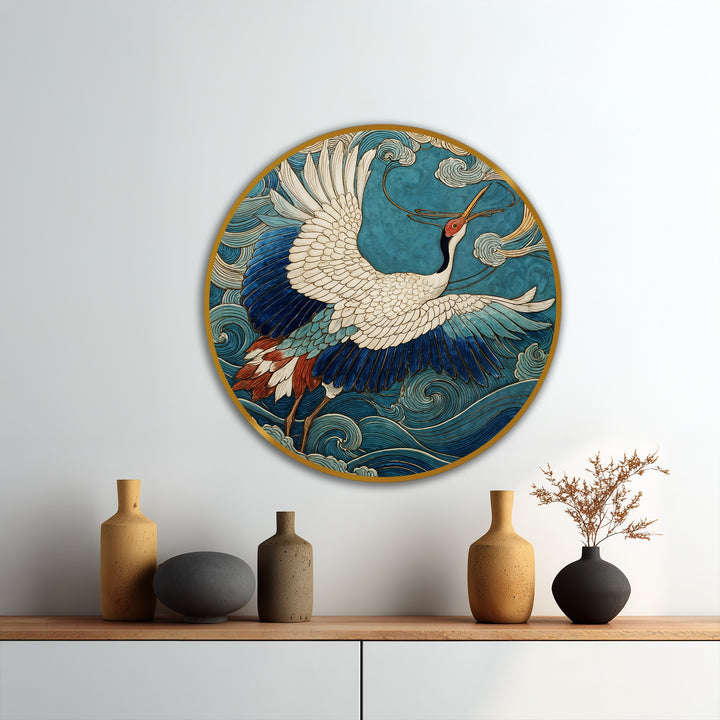 Turquoise dominates this round oil painting, depicting a graceful crane soaring over stylized ocean waves with modern oil painting art elements.