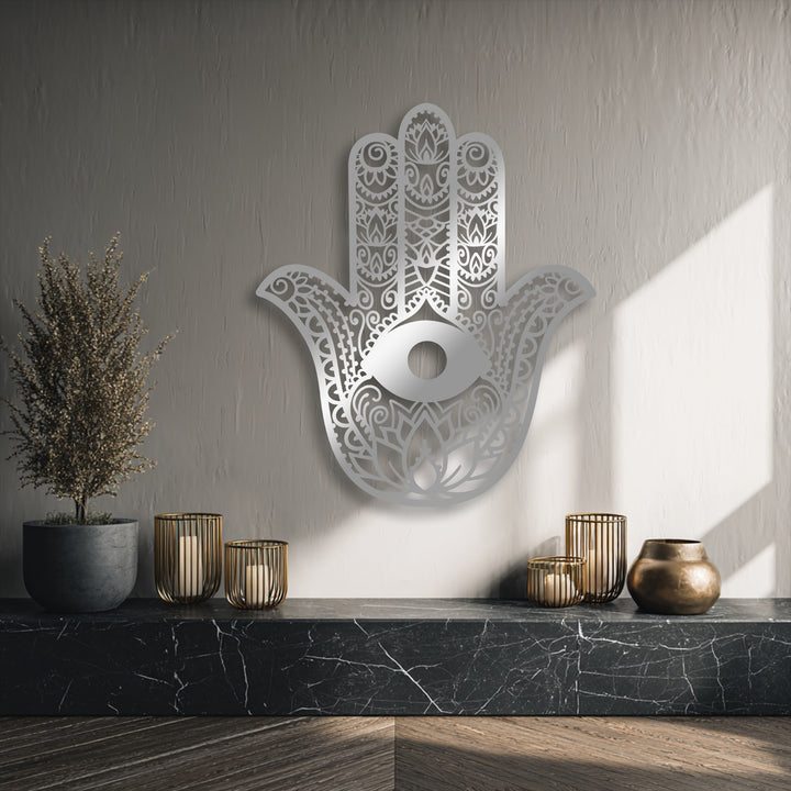 Intricate geometric elements form the stunning Hamsa Hand unique metal wall art, showcasing a protective evil eye design.