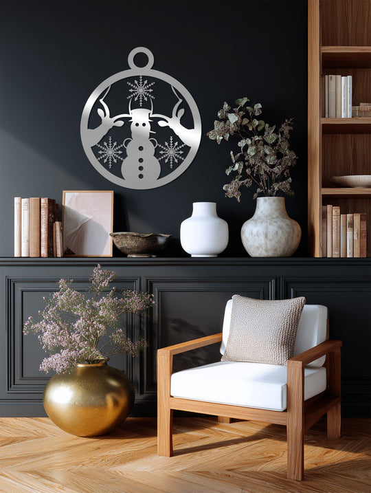 Highlighting the abstract quality, the Christmas decoration wall art showcases a winter scene with a reindeer and snowman, crafted from metal and adorned with festive snowflakes.