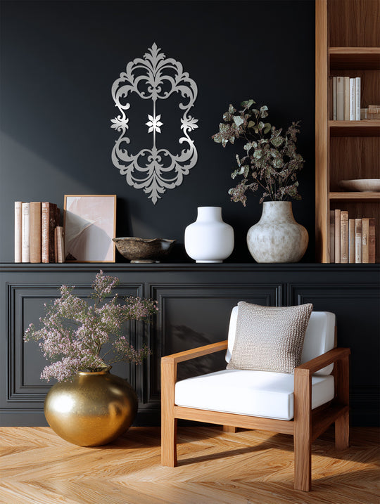 Reflecting light, the ornate silver metal artwork captures attention, showcasing the 'Victorian Grace' metal wall art, offering elegant metal artwork in the room.
