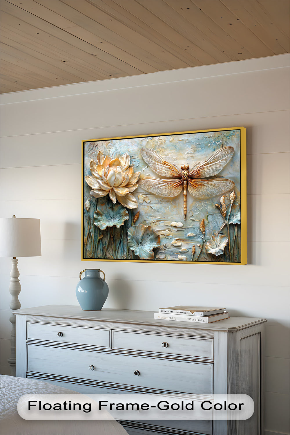 A beautifully detailed embossed-style painting showcasing a shimmering dragonfly and delicate water lilies in soft gold and pastel blue tones.