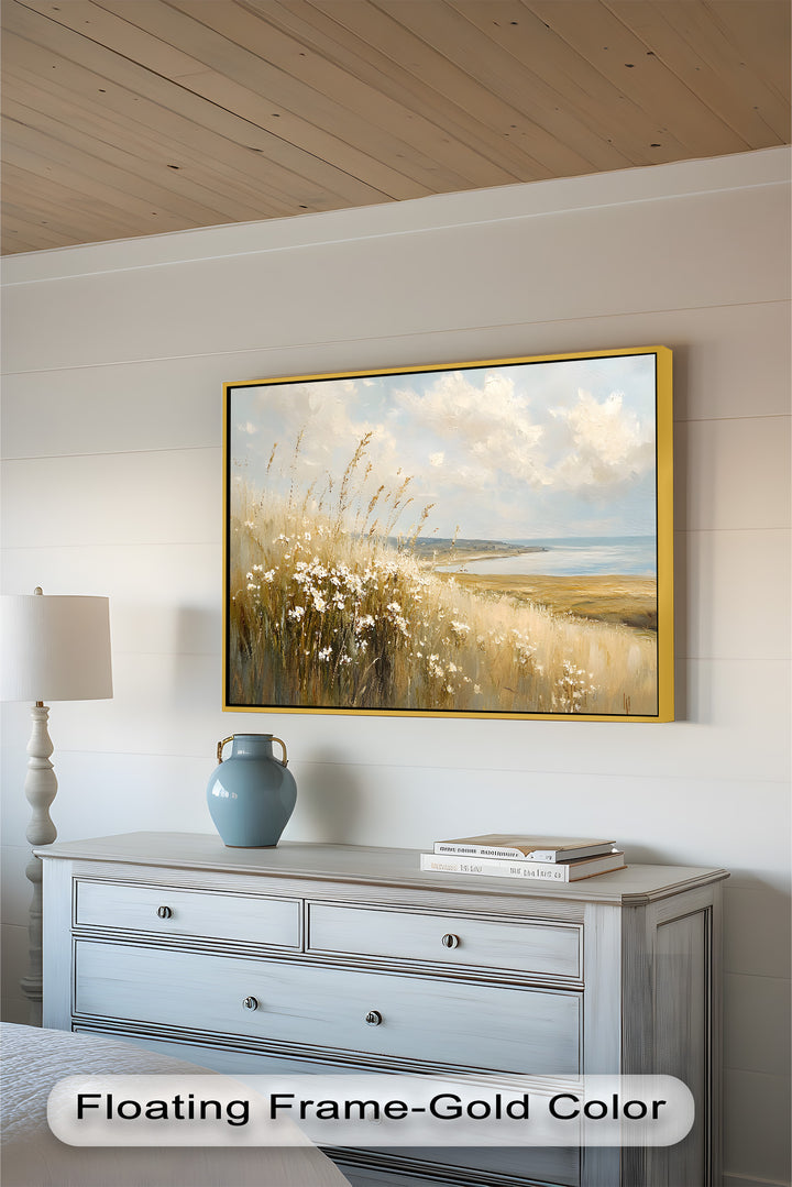 A dreamy seascape bathed in warm, natural tones showcases a peaceful shoreline, where rolling meadows and wispy clouds create a tranquil and timeless atmosphere.