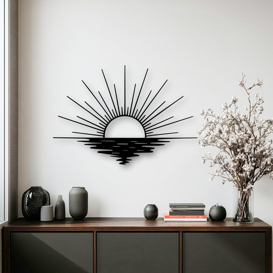The serene, neutral color temperature enhances the minimalist sun rays ocean decorative metal art displayed above a dark wooden console.
