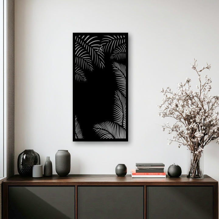 A sleek, smooth surface texture defines the elegant black and silver tropical palm leaf metal art for wall, showcasing its detailed design.
