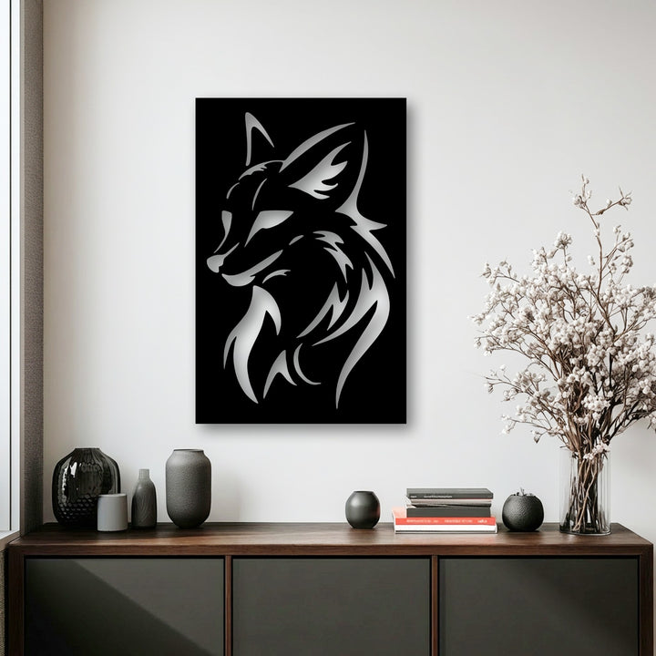 The clean, creamy white wall behind the fierce wolf head silhouette metal wall decor sits above a dark wood credenza.