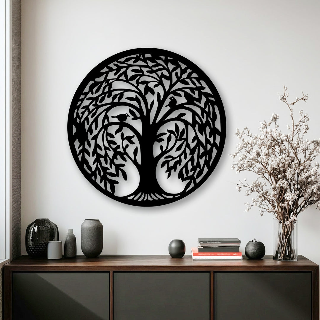 The illuminated white wall vividly showcases the detailed Tree of Life circular silhouette decoration wall art with clear shadows.