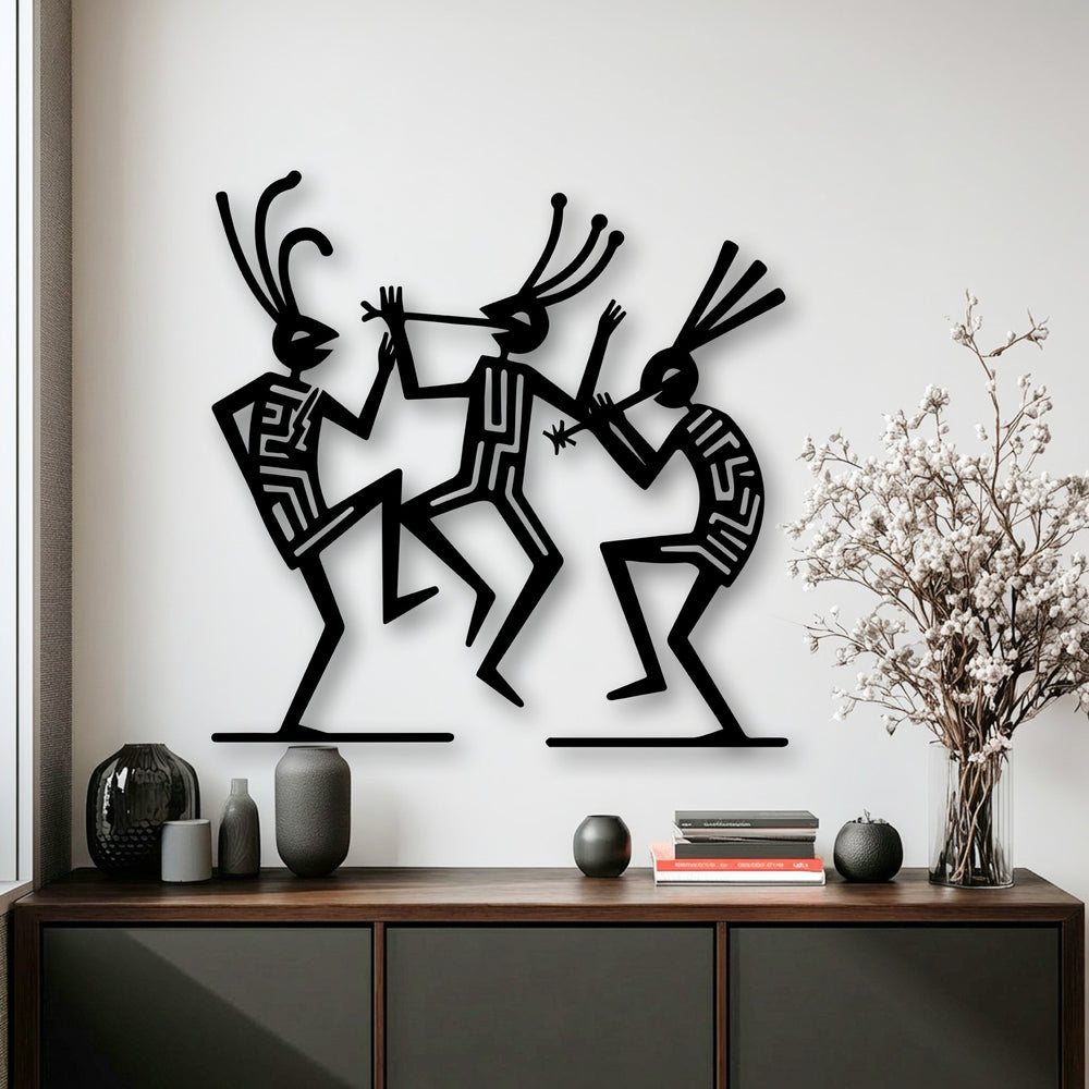 Dynamic tribal dance figures, crafted as black metal wall decor, showcase an energetic cultural rhythm with their expressive, dancing poses.