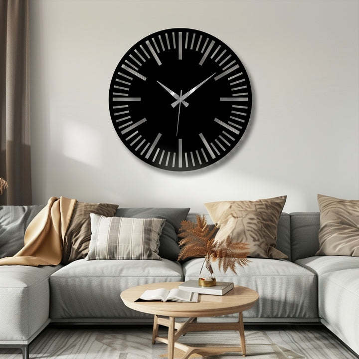 Crafted from robust metal, this minimalist black dial wall clock offers both luxury and durability as a timeless piece of decorative metal art.