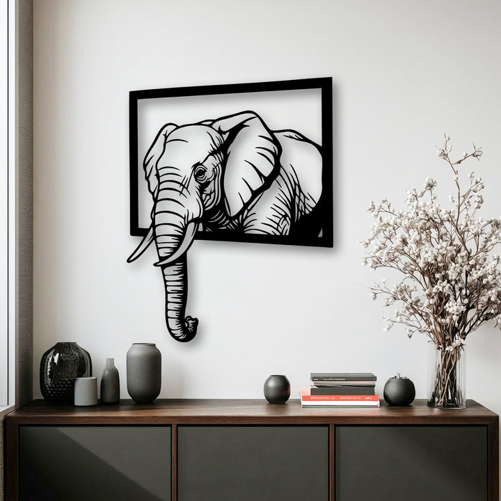 The striking black elephant artwork with a captivating 3D emerging effect from its frame is a bold piece of decoration wall art.
