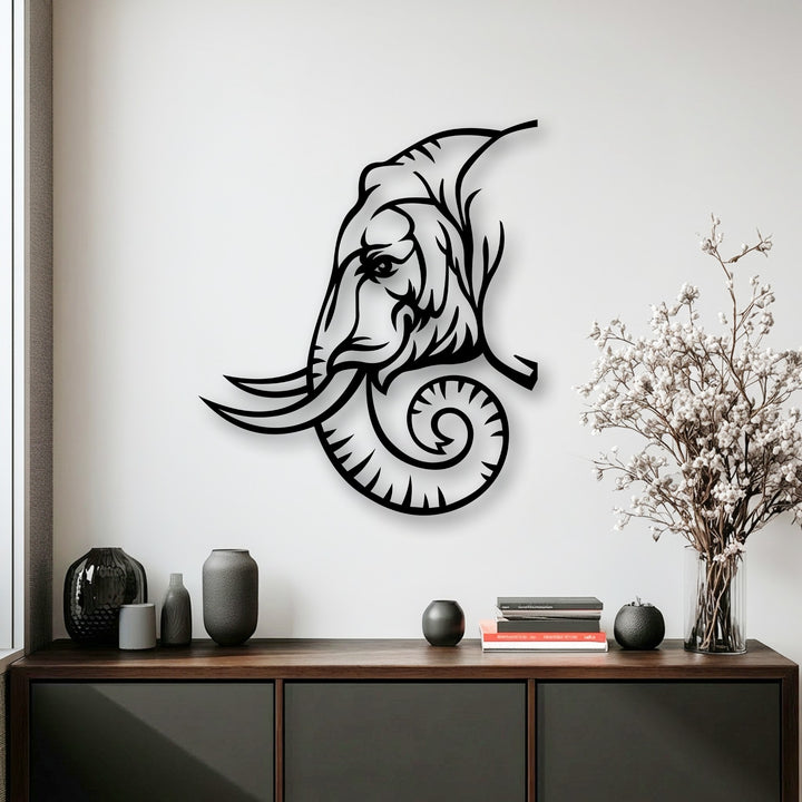 The refined surface texture of the majestic elephant metal artwork subtly reflects light, highlighting its intricate line art design.