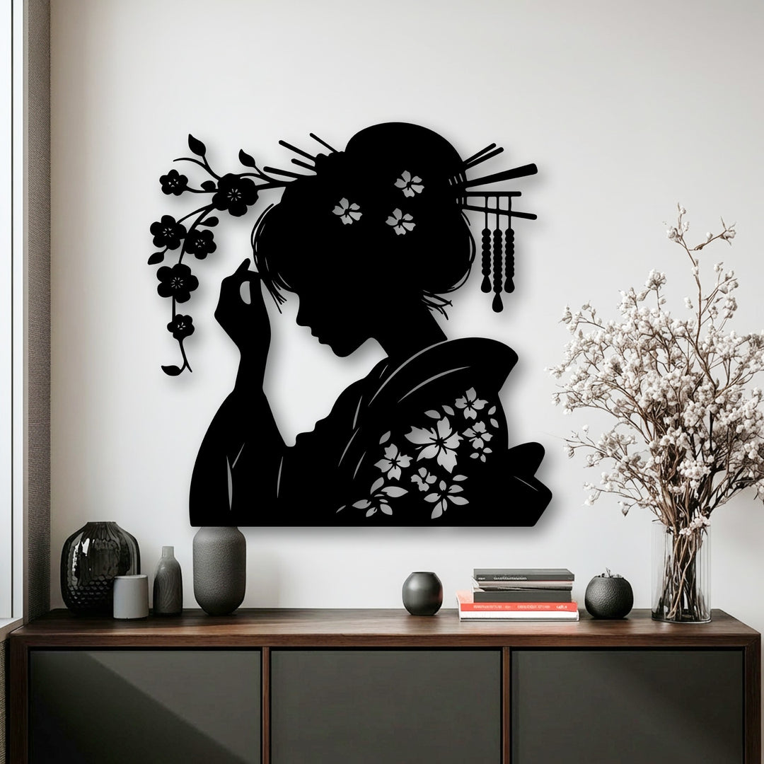 This oriental metal art for wall evokes a tranquil and sophisticated mood with its elegant geisha silhouette and cherry blossoms.
