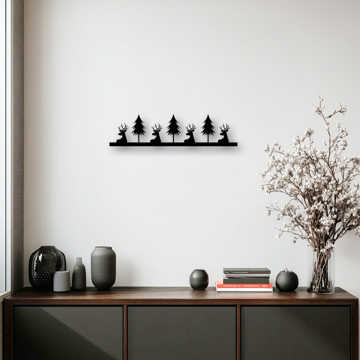 Geometric silhouettes of alternating deer and pine trees form a harmonious horizontal line of rustic metal wall decor.
