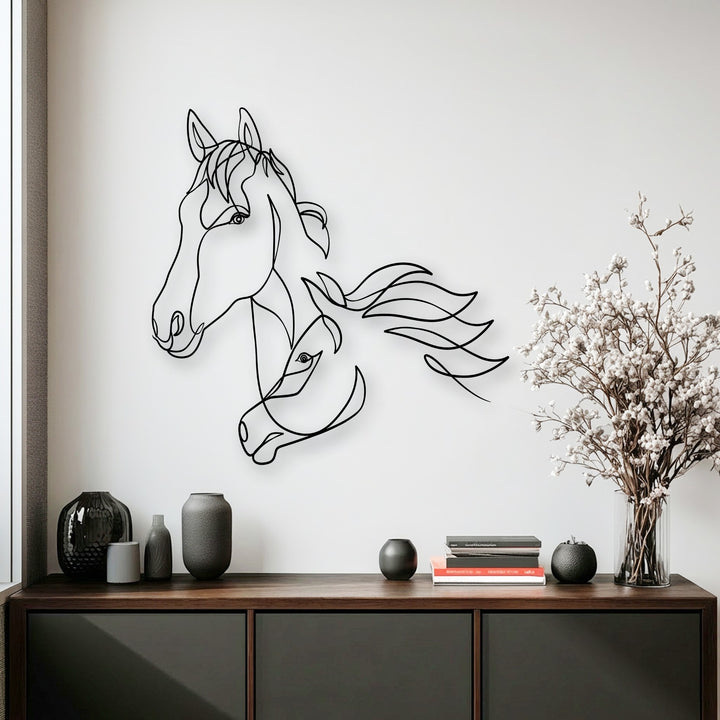 Visual rhythm is created by the flowing black lines of the minimalist dual horse decoration wall art, elegantly depicting two horse heads.