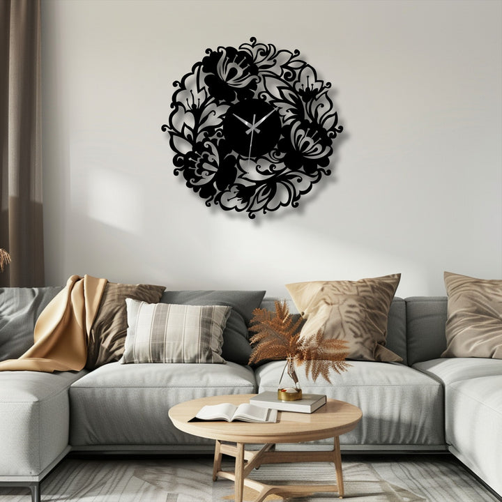 Shadows and light play on the Bloom Garden decorative metal art clock, highlighting the intricate floral details of this elegant wall-mounted home decor piece.