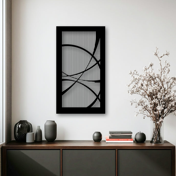 A striking modern abstract geometric metal art for wall showcasing a harmonious composition of white lines and bold black curves.