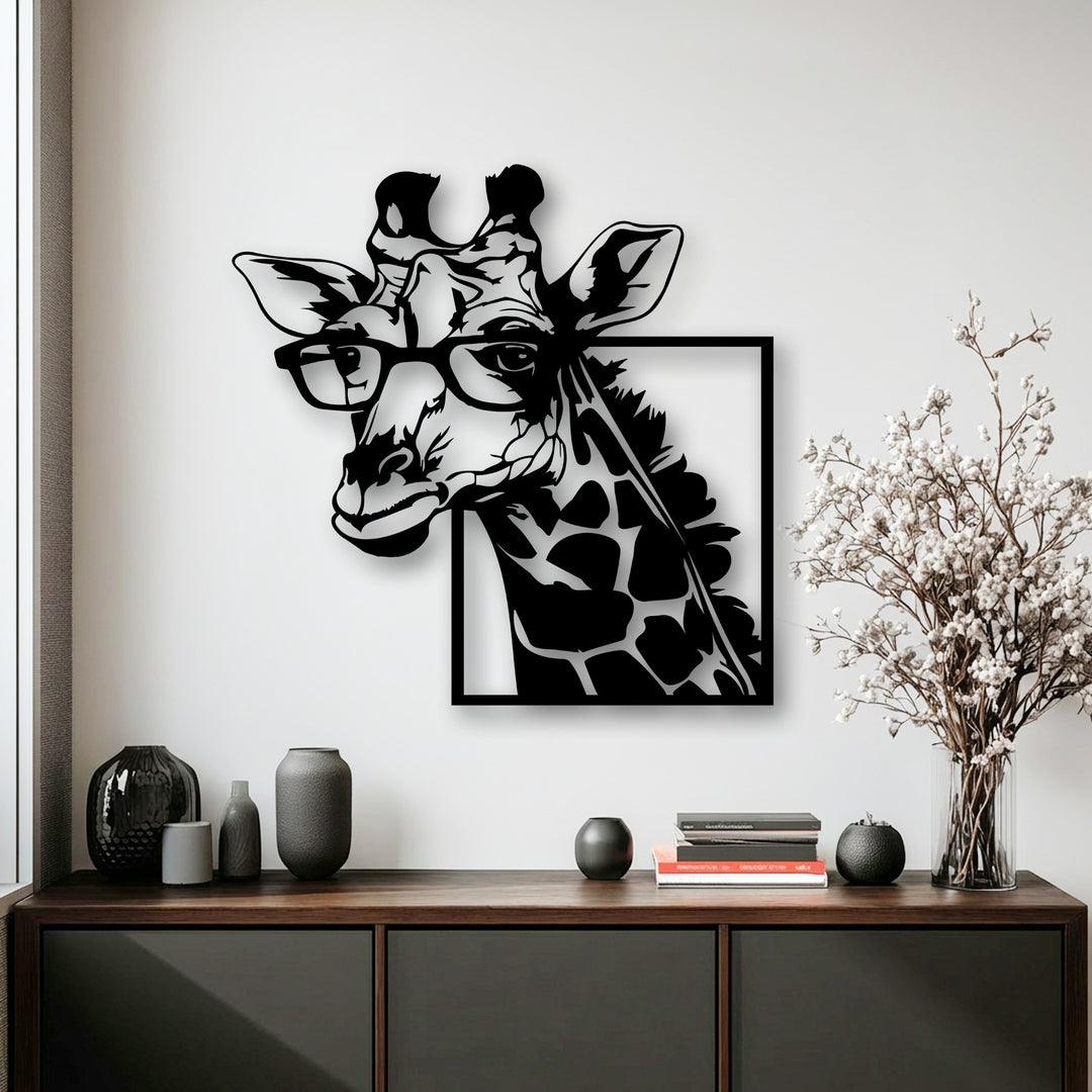 The matte black finish of this stylish giraffe with glasses metal decoration wall art creates a striking silhouette on a white wall.