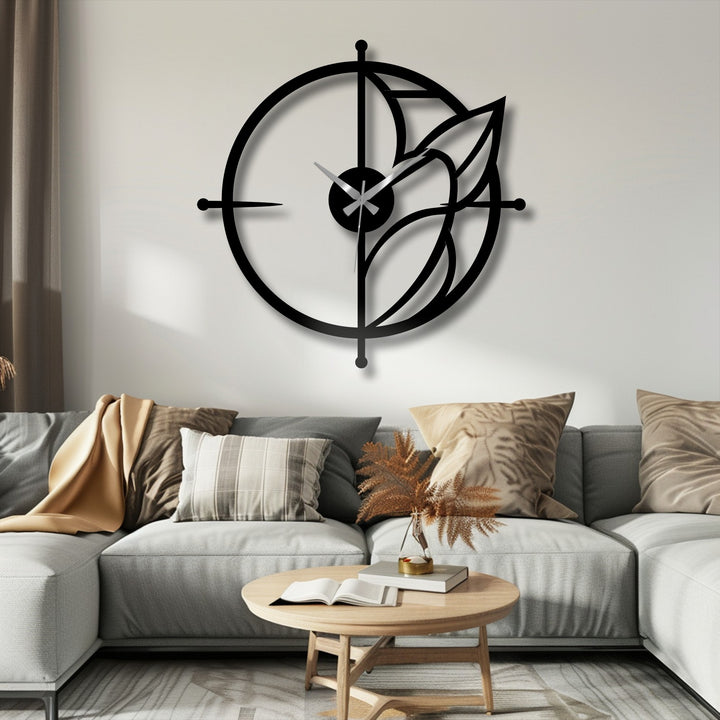 Moderately saturated tones enhance the elegant, circular design of this modern leaf accent metal art for wall clock, creating a refined focal point.